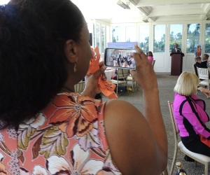 Dr.-Maxine-Anderson-capturing-an-image-of-Dr.-William-Long-during-his-presentation