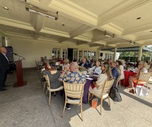 Dr. Paul Gilbert, Board President, addresses the Angels