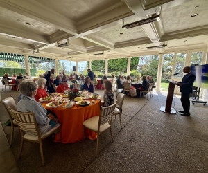 John Kumar, MD,  co-medical director, opens the luncheon