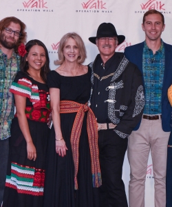 Dr.-Paul-and-Cindy-Gilbert-RN-and-family-posing-on-the-Red-Carpet