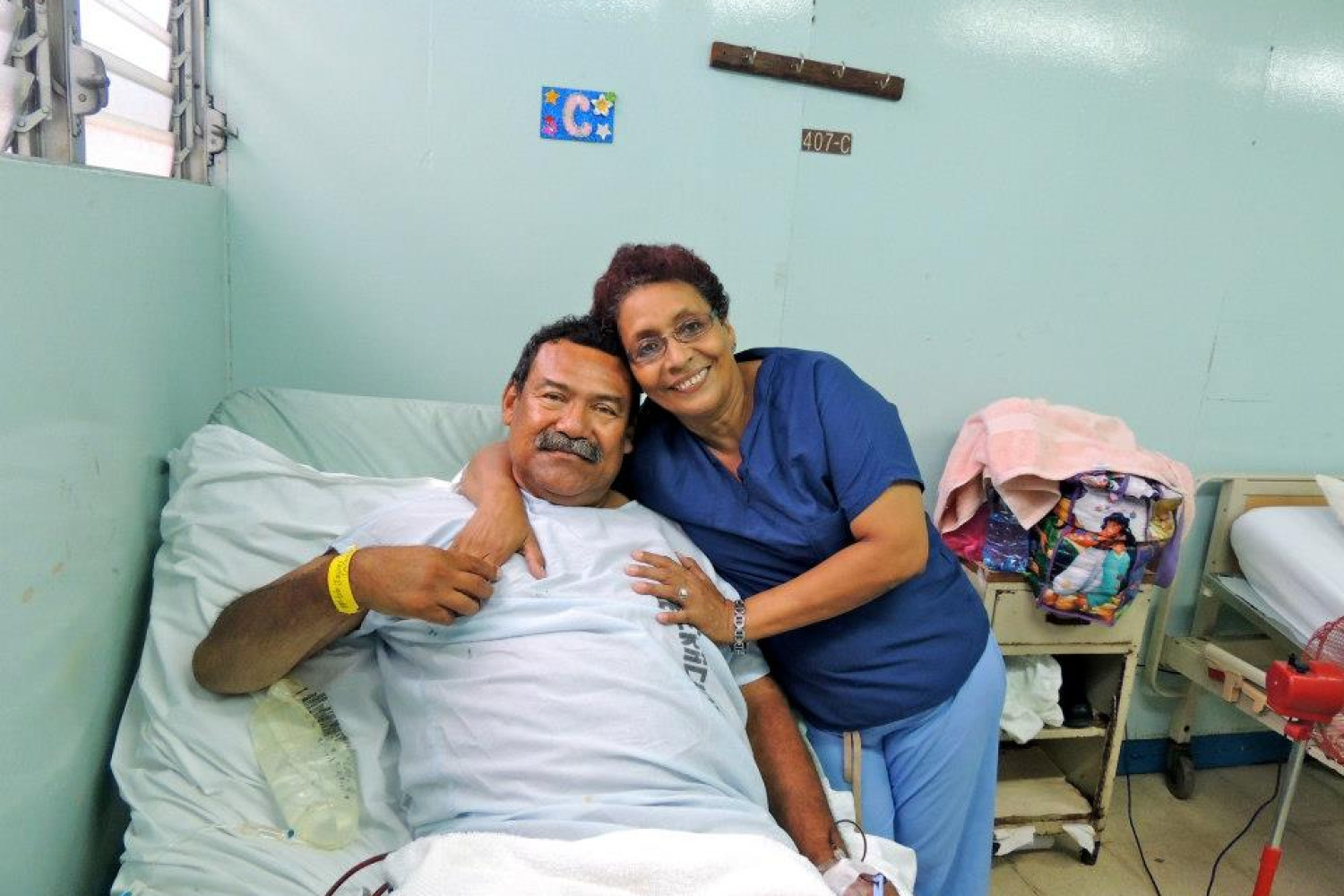 Patient and his wife, happy after a successful surgery (this man was a coach and referee and had not been able to work for over a year, he was looking forward to getting back on the playing field and getting back to work)