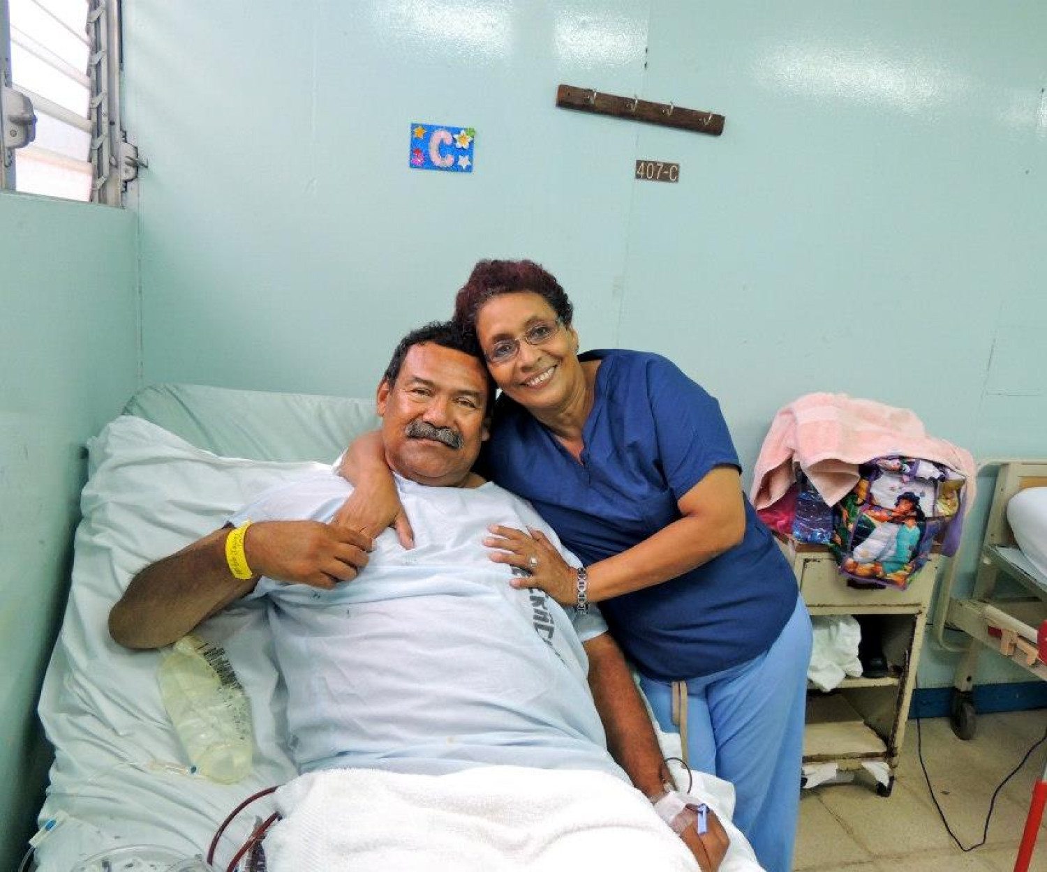Patient and his wife, happy after a successful surgery (this man was a coach and referee and had not been able to work for over a year, he was looking forward to getting back on the playing field and getting back to work)