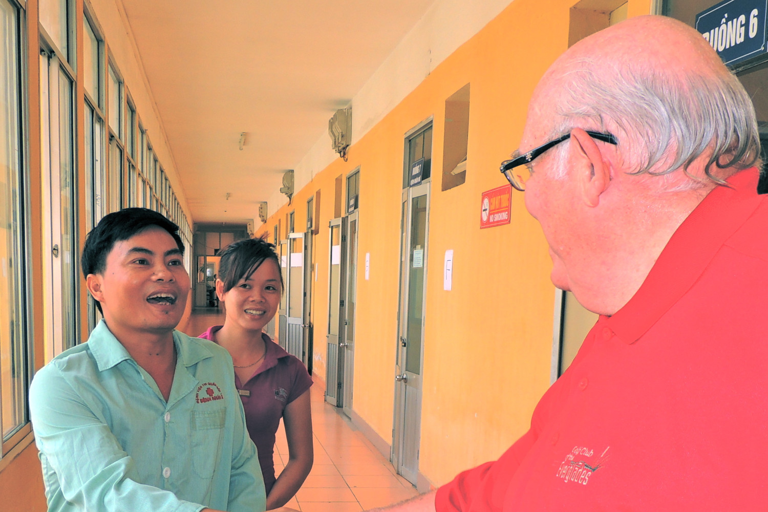 Dr. Dorr meeting a patient who received a new hip two days before