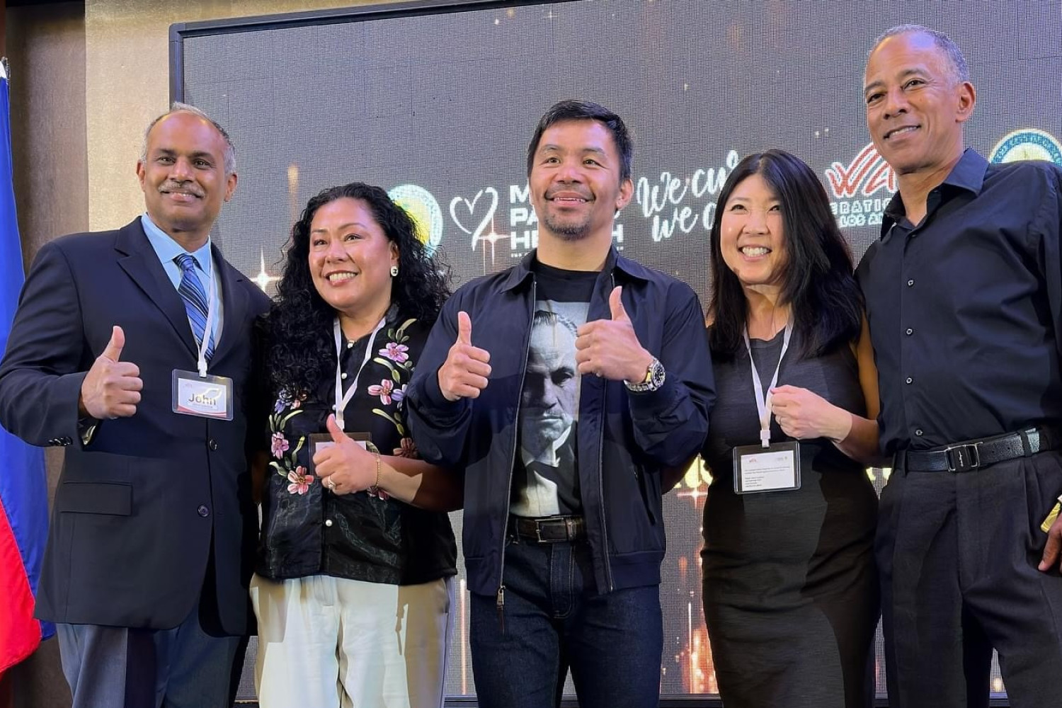 Dr. John Kumar, Trish Lindsey RN, Lisa Fujimoto PA, and Dr. William Long with Sir Manny Pacquiao at the Operation Walk welcome banquet