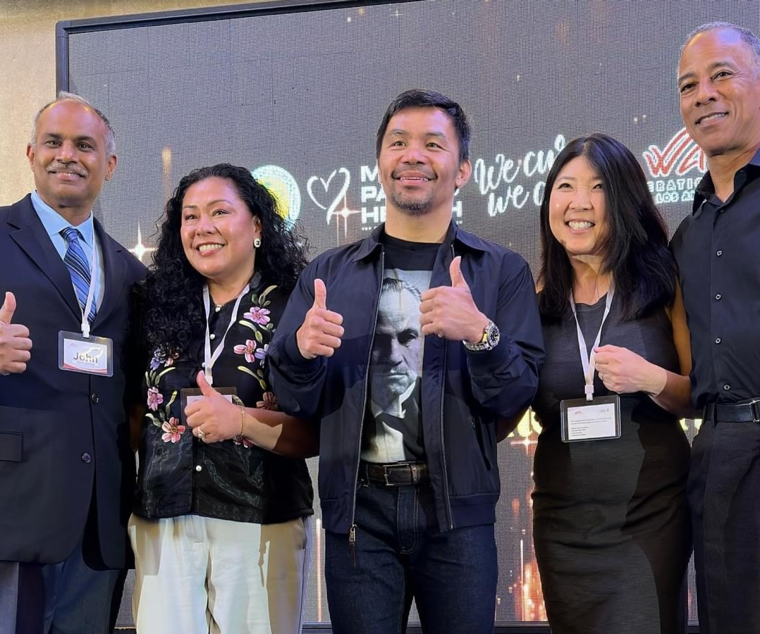 Dr. John Kumar, Trish Lindsey RN, Lisa Fujimoto PA, and Dr. William Long with Sir Manny Pacquiao at the Operation Walk welcome banquet