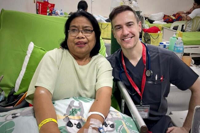 Dr. David Rawson with a happy patient post-surgery