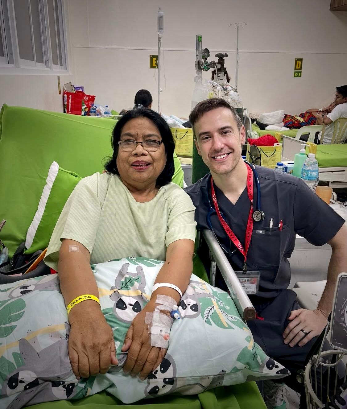 Dr. David Rawson with a happy patient post-surgery 