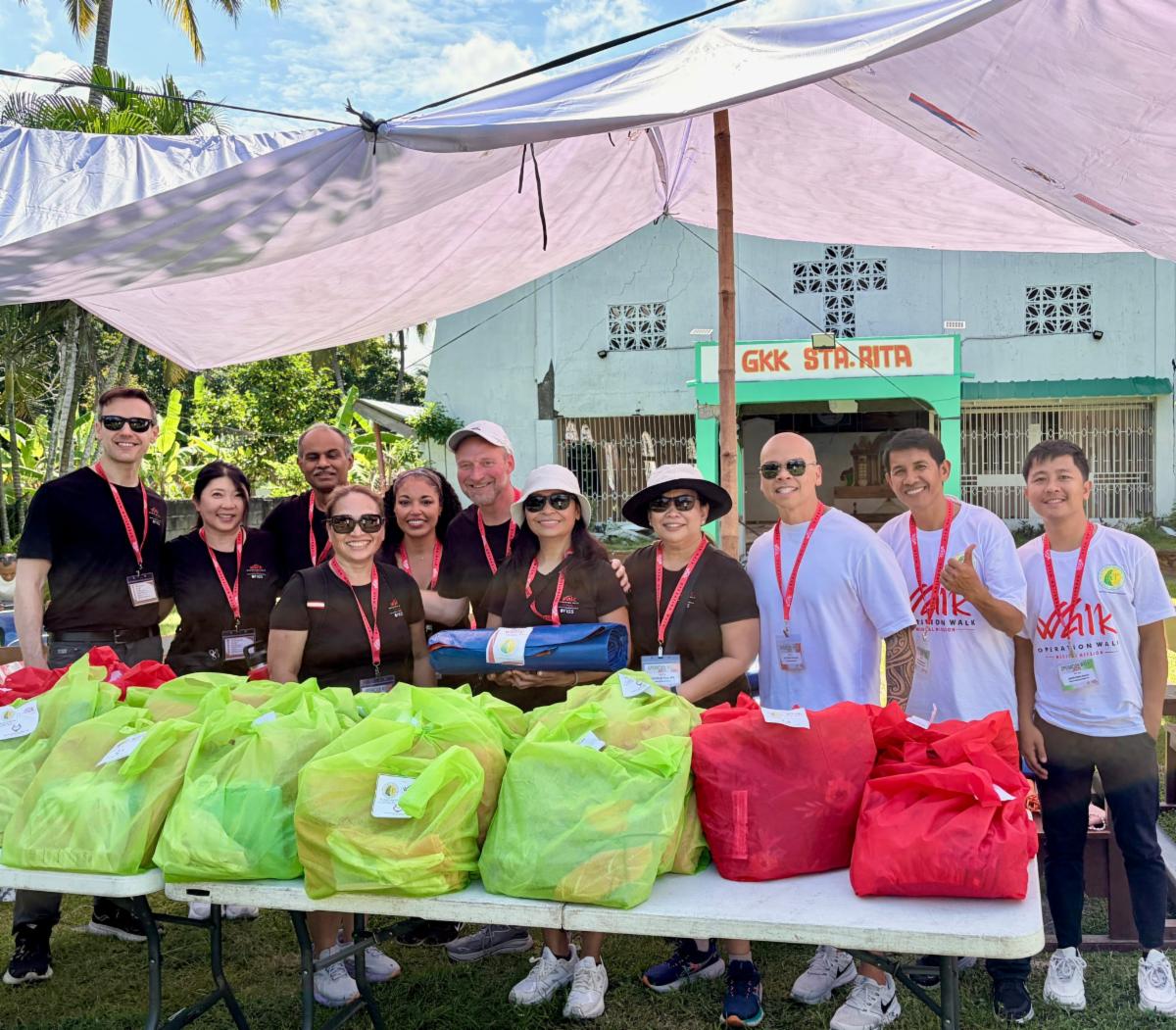 Team distributing relief packages in Glan. 